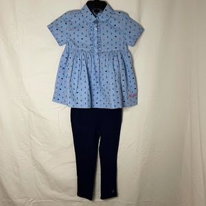 long dress like top with navy stretch pants.
